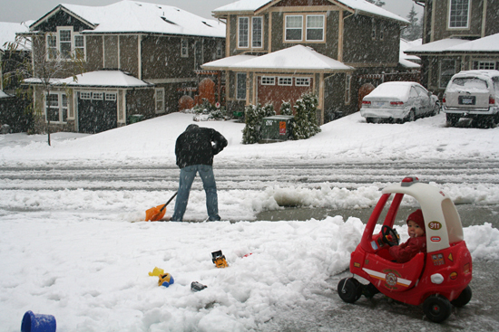 Supervising the shovelling of the driveway