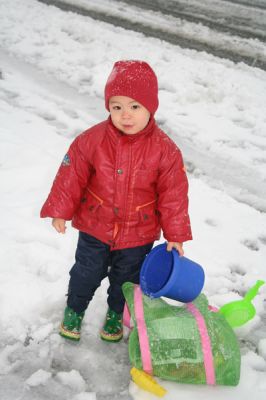 Caleb with snow toys