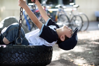 Caleb on a tire swing